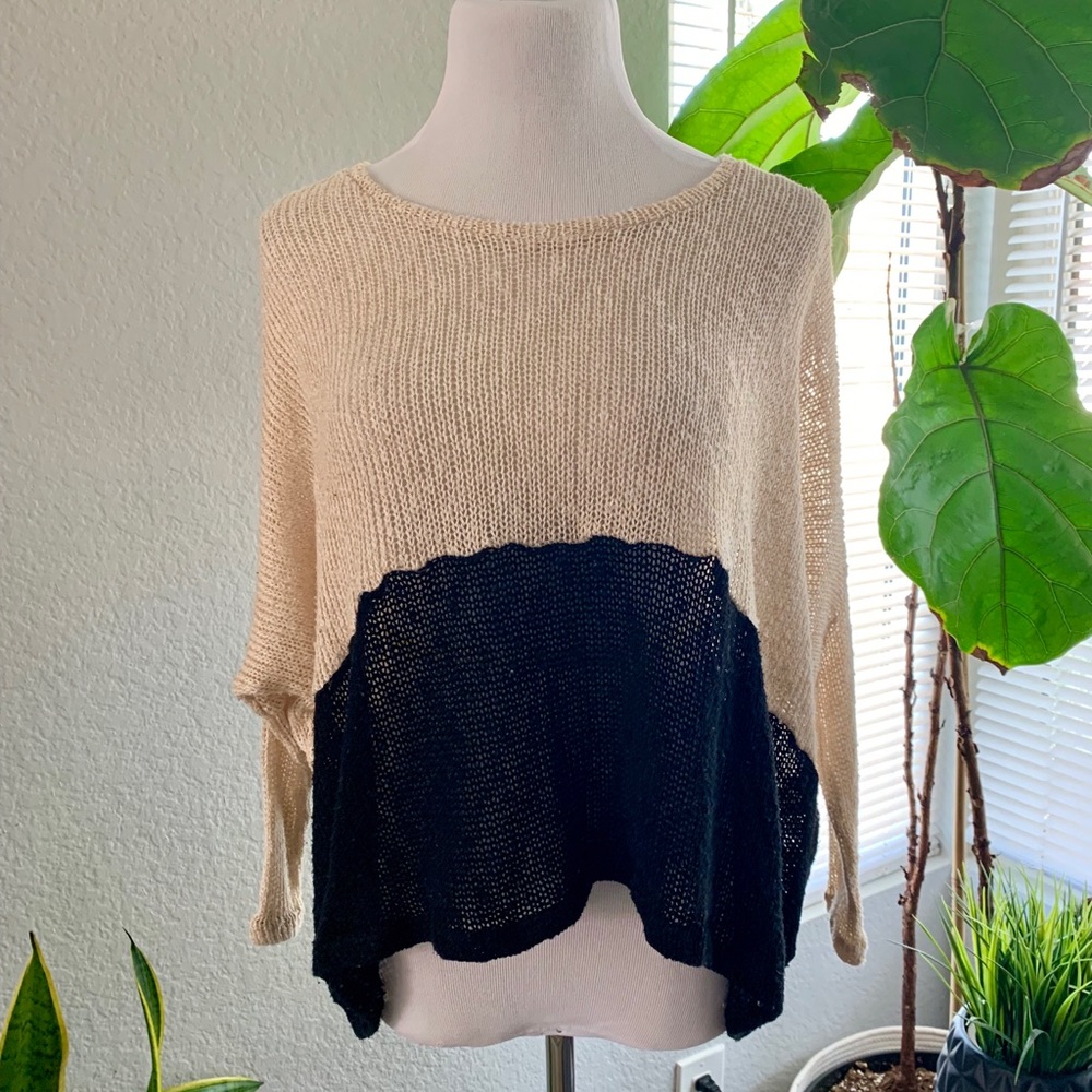 Beige and black sweater